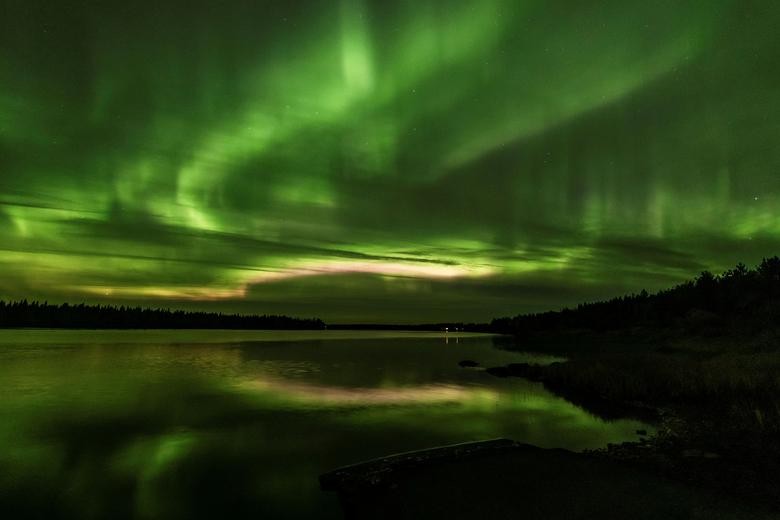 The Aurora Borealis (Northern Lights) is seen over the sky near Rovaniemi in Lapland, Finland September 25, 2020. REUTERS/Alexander Kuznetsov